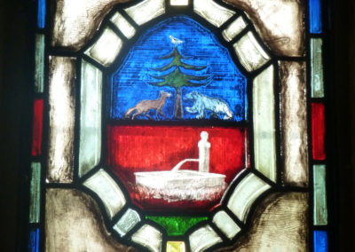 Les armoiries de Bassins sur un vitrail dans l’église
